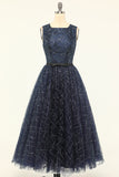 Abito da ballo in tulle blu navy glitterato