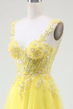 Abito da ballo bustier in tulle con spacco e perline giallo