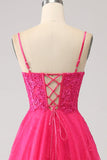 Abito da ballo fucsia con spacco lungo in pizzo bustier A-Line