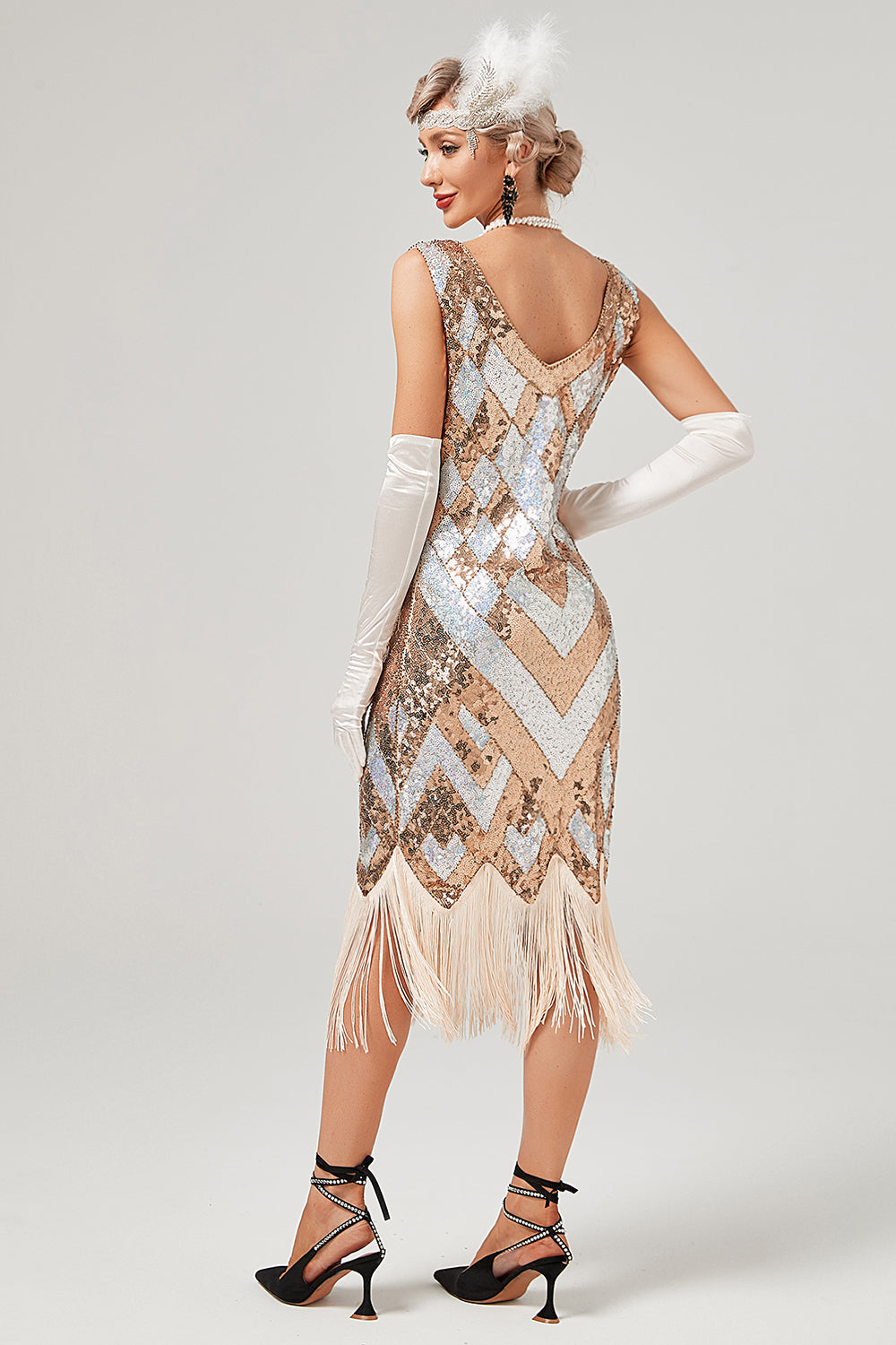 Paillettes dorate abito anni '20 con frange