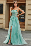 Abito da ballo corsetto in tulle verde a trapezio con applicazioni