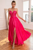 Abito da ballo fucsia senza spalline con spacco