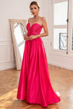 Abito da ballo fucsia senza spalline con spacco