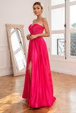 Abito da ballo fucsia senza spalline con spacco