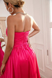 Abito da ballo fucsia senza spalline con spacco