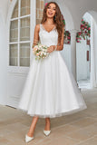 Abito da sposa in tulle a metà polpaccio bianco con pizzo