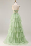 Corsetto verde senza spalline A Line Tulle a livelli con lunga fessura e fessura