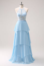 Scintillante blu Halter floreale lungo abito da damigella d'onore con lacci sul retro