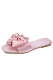 Pantofole rosa da donna con fiocco