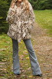 Maxi cappotto in shearling leopardato con cintura