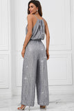 Tuta a gamba larga senza maniche con paillettes glitter grigie