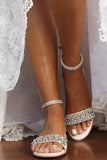 Sandalo con tacco basso con strass dorati