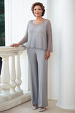 Tuta formale in chiffon con paillettes grigie scintillanti a maniche lunghe