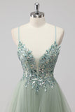 Abito da ballo lungo in tulle con lacci sul retro con paillettes verdi