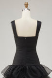 Abito formale high-low high-low in organza nera con fessura a volant