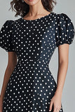 Abito nero con scollo rotondo a trapezio lungo a pois bianchi