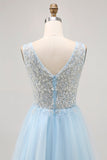 Abito corto da cerimonia in tulle blu scintillante con paillettes
