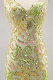 Vestito da cocktail aderente con paillettes verdi