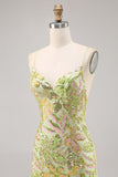 Vestito da cocktail aderente con paillettes verdi