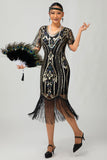 Sparkly Flapper nero dorato paillettes aderente frange abito anni 1920