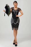 Abito corto anni 1920 con paillettes Gatsby argento nero con frange