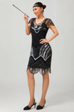 Abito corto anni 1920 con paillettes Gatsby argento nero con frange