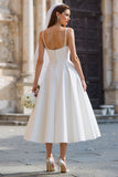 Abito da sposa lungo con spalline spaghetti bianca a linea A con fiocco staccabile