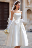Abito da sposa lungo con spalline spaghetti bianca a linea A con fiocco staccabile