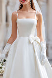 Abito da sposa bianco a spalline spaghetti con fiocco