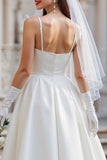 Abito da sposa bianco a spalline spaghetti con fiocco