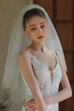 Velo da sposa corto in tulle avorio con perle