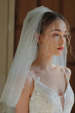 Velo da sposa corto in tulle avorio con perle
