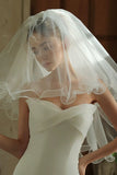Velo corto da sposa in tulle avorio con fiocco