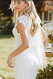 Abito da sposa a maniche a merletto bianco con fessura