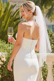 Abito da sposa bianchino senza spalline in raso bianco con cerniera posteriore