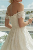 Abito da sposa midi in avorio a spalle scoperte