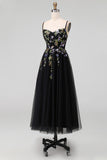 Abito Midi nero con spalline spaghetti in tulle applicato