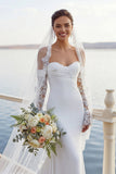 Abito da sposa lungo in chiffon con frusci in sirena avorio