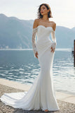 Abito lungo da sposa in merletto sirena applicato in chiffon avorio