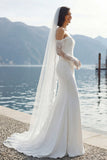 Abito lungo da sposa in merletto sirena applicato in chiffon avorio