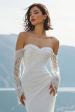 Abito lungo da sposa in merletto sirena applicato in chiffon avorio