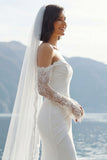Abito lungo da sposa in merletto sirena applicato in chiffon avorio