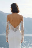 Abito lungo da sposa in merletto sirena applicato in chiffon avorio