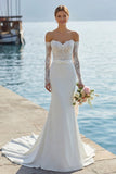 Abito da sposa lungo con fiocco sirena applicato in pizzo d'avorio