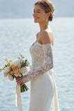 Abito da sposa lungo con fiocco sirena applicato in pizzo d'avorio