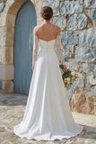 Abito da sposa lungo senza spalline in avorio con fessura
