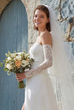 Abito da sposa lungo senza spalline in avorio con fessura