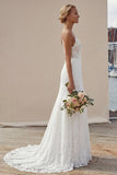 Abito da sposa con spallette in avorio a linea lunga con pizzo applicato e fessura