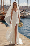Abito da sposa lungo con spallette in pizzo in avorio con spallone e apertura