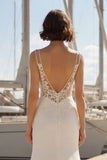 Abito da sposa con spallette spaghetti applicate in raso avorio di sirena e fessura